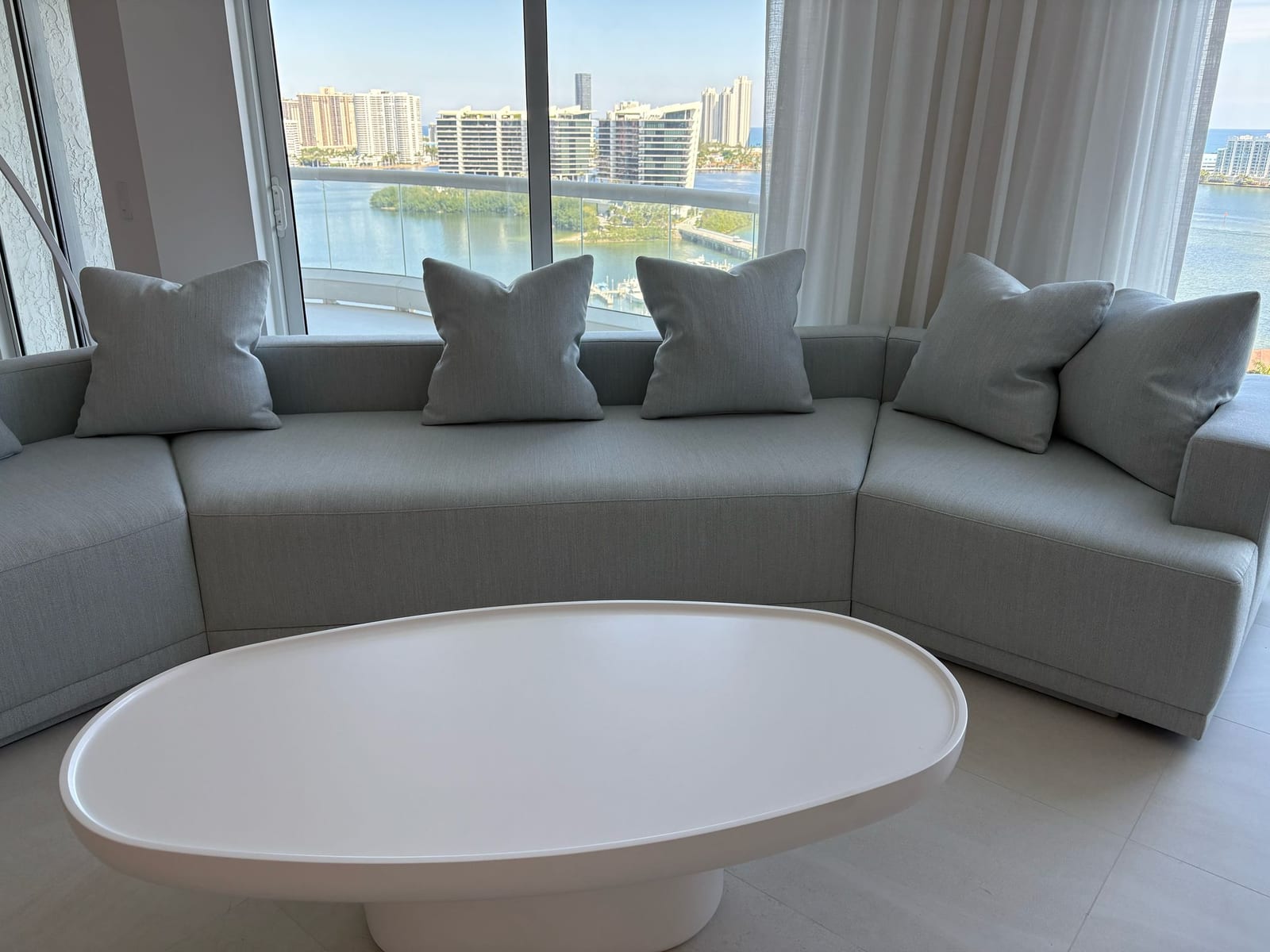 Custom curved sectional sofa in a waterfront home
